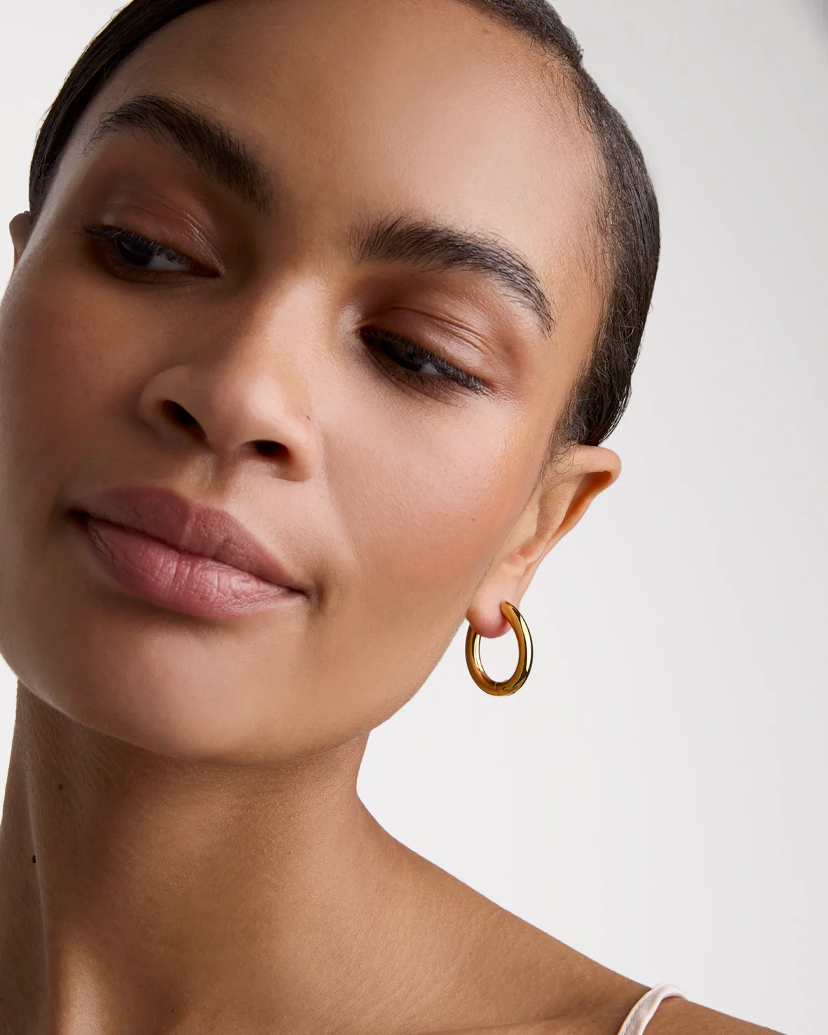 Waterproof Chunky Oval Hoops in Gold - Image 2