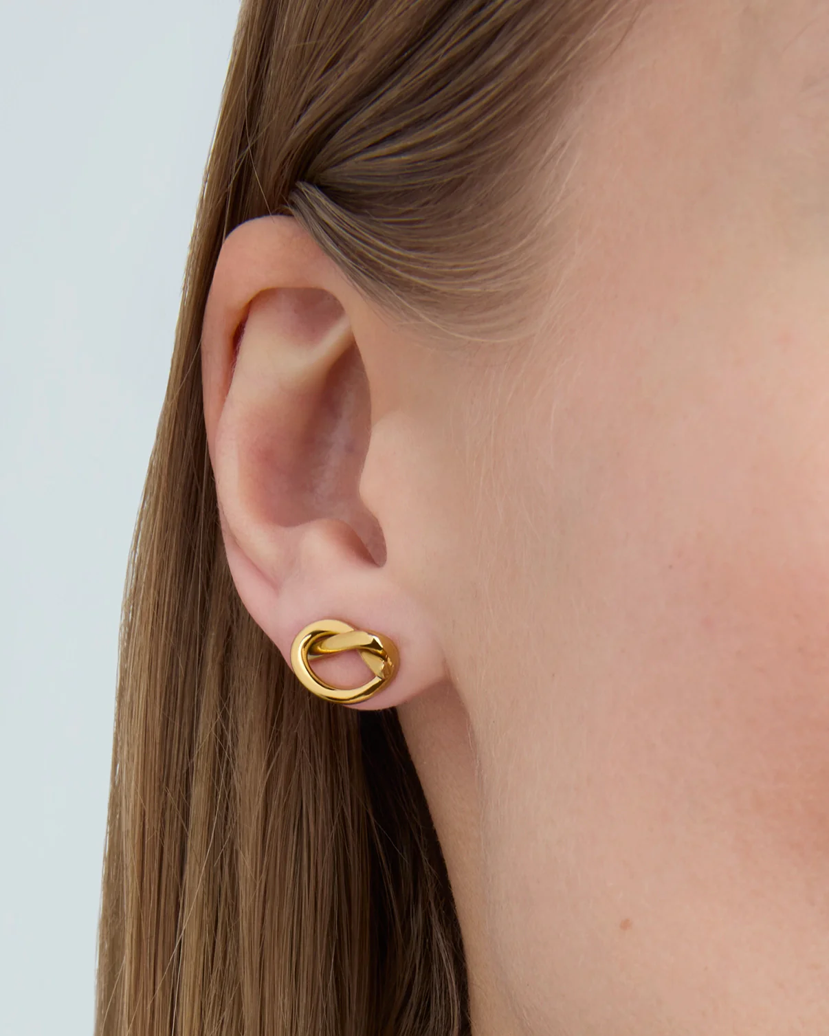 Waterproof Small Knot Stud Earrings in Gold - Image 2