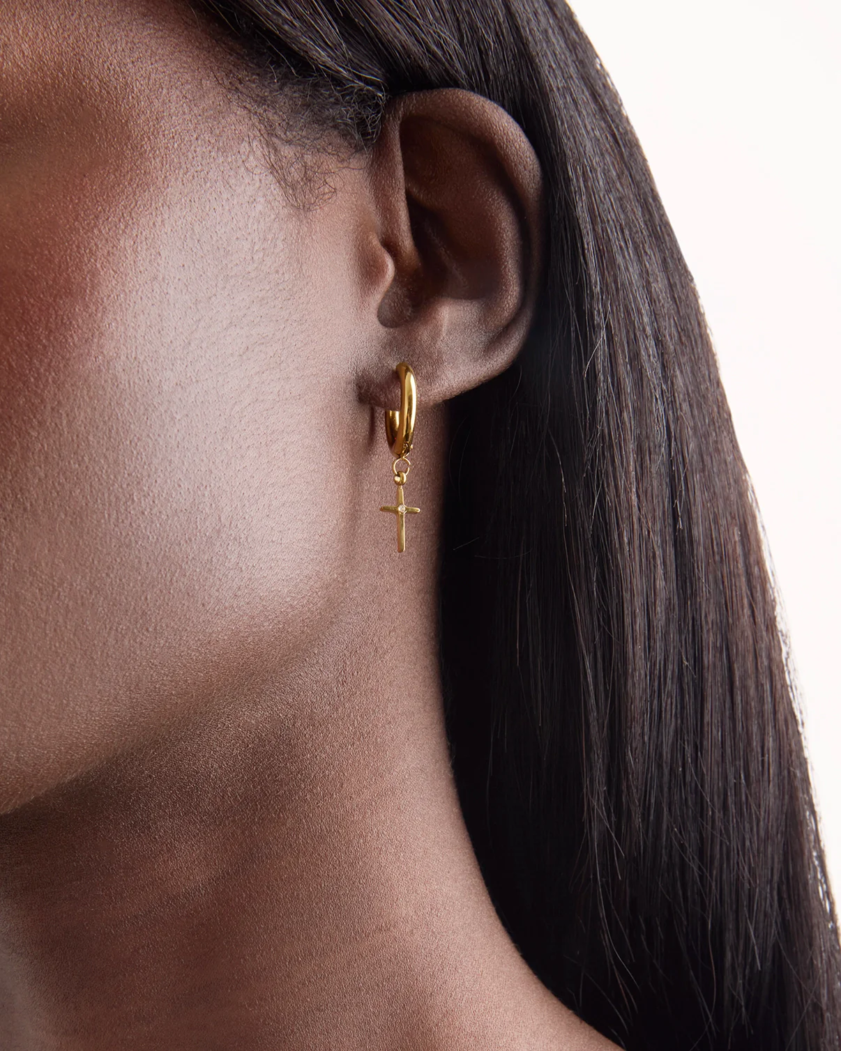 Waterproof Cross Drop Huggie Earrings in Gold - Image 2