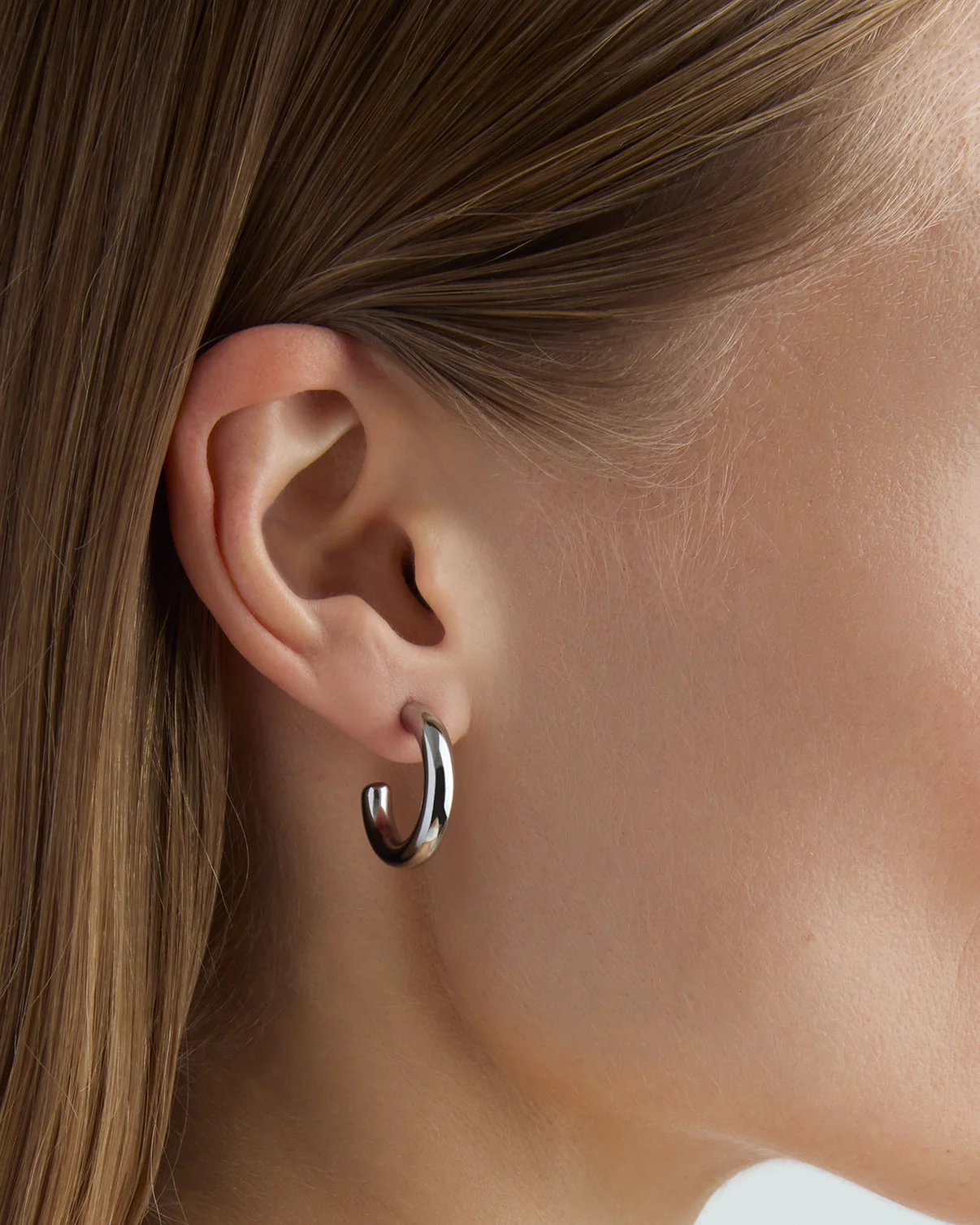 Small Thick Hoop Earrings in Silver - Image 2