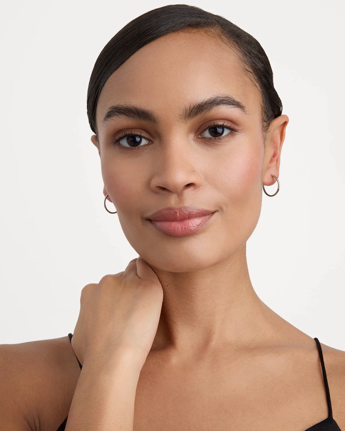 Thin Round Seamless Huggie Hoop Earrings in Silver - Image 2