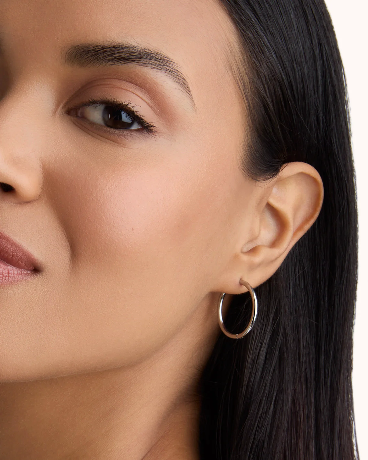 Round Seamless Huggie Hoop Earrings in Silver - Image 2