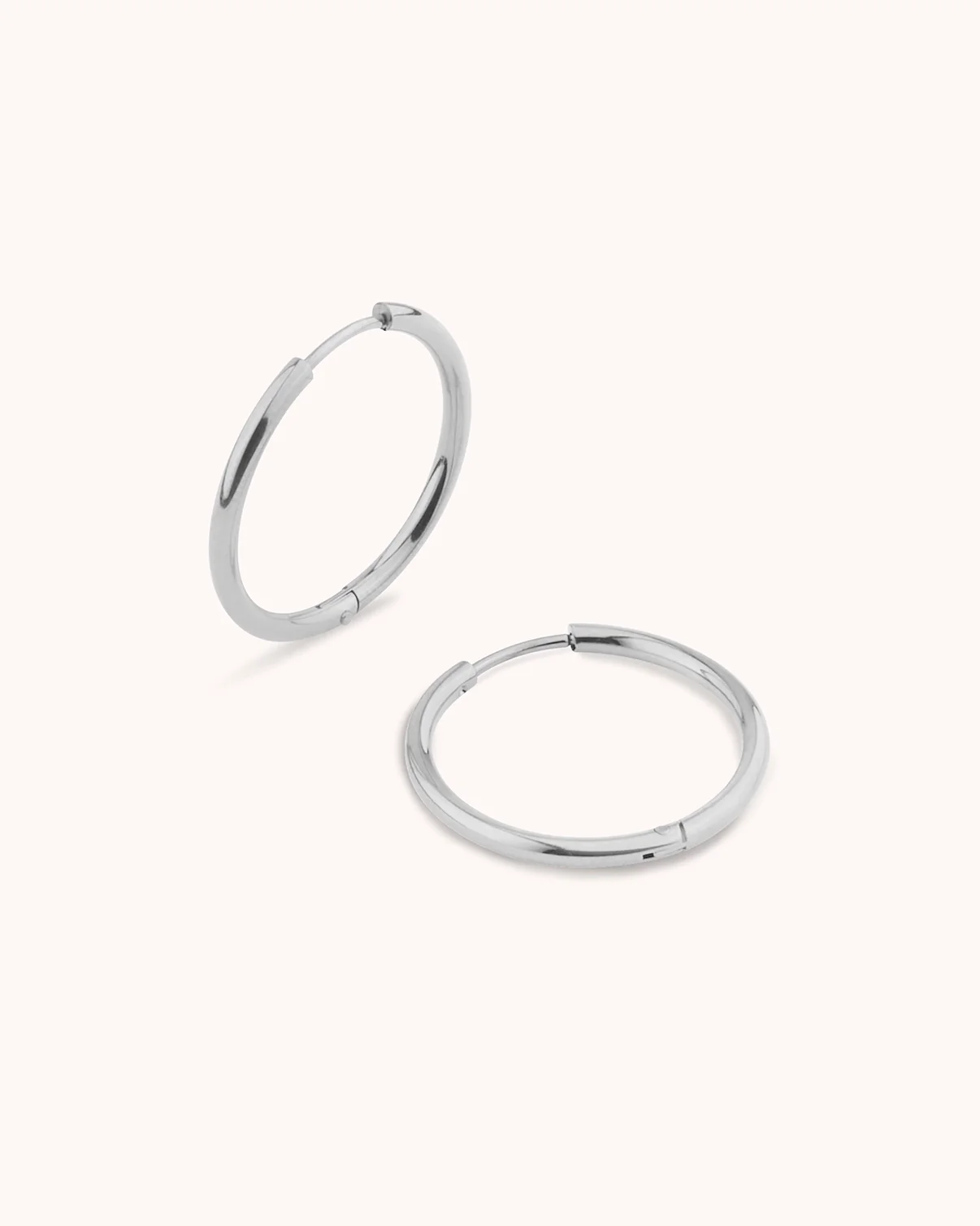 Round Seamless Huggie Hoop Earrings in Silver - Image 3