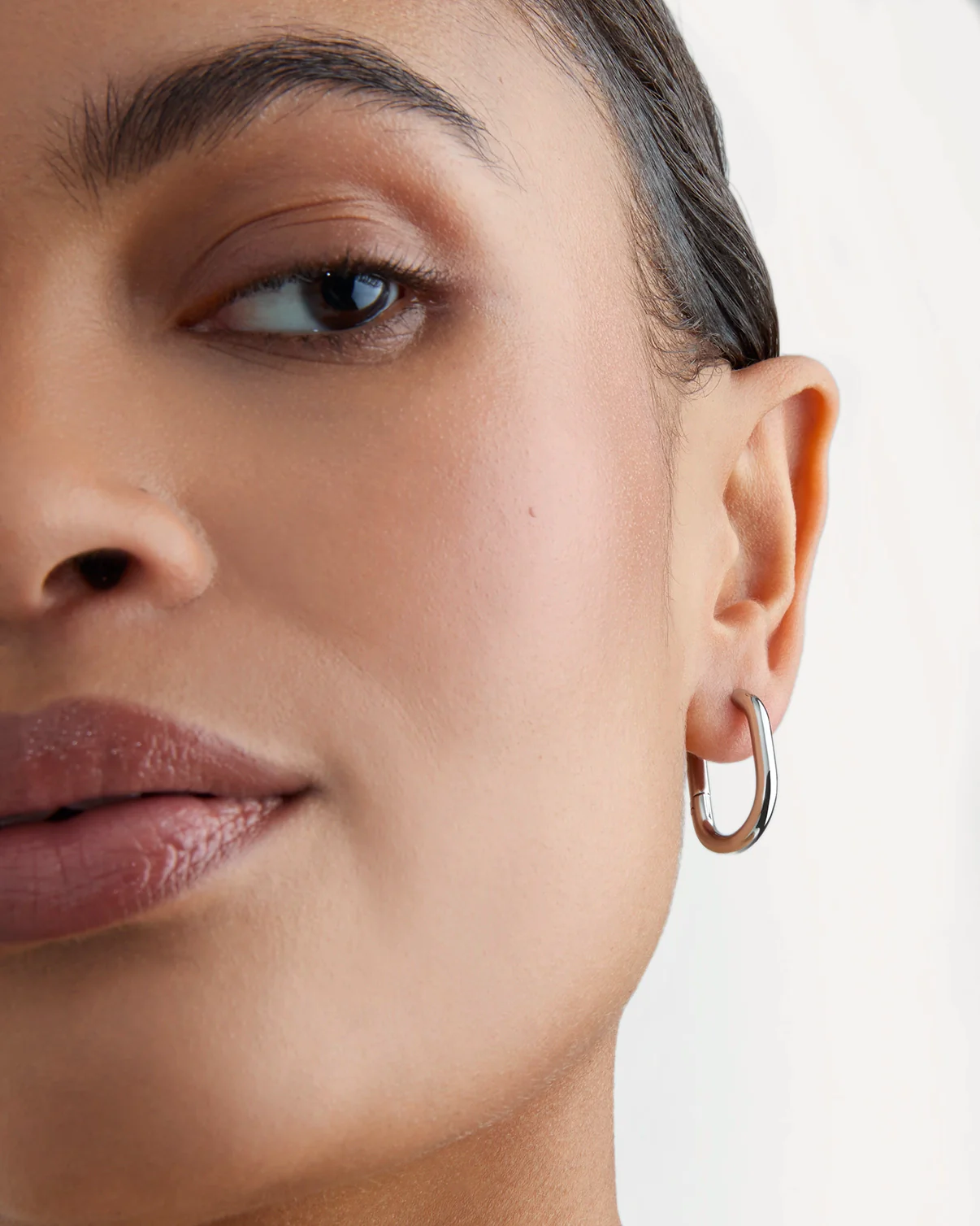 Long Circle Seamless Huggie Earrings in Silver - Image 2