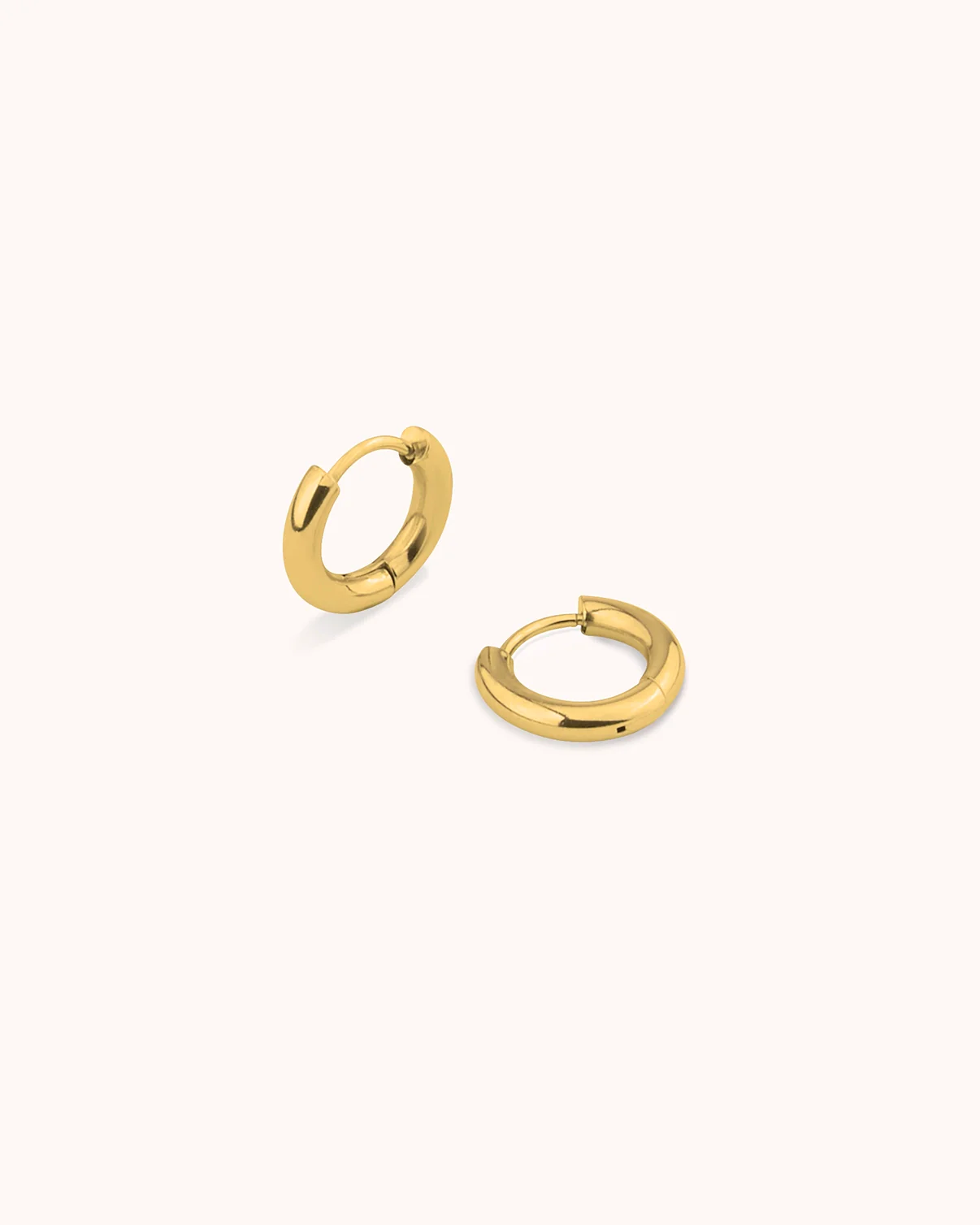 Waterproof Small Circle Seamless Huggie Hoop Earrings in Gold - Image 3