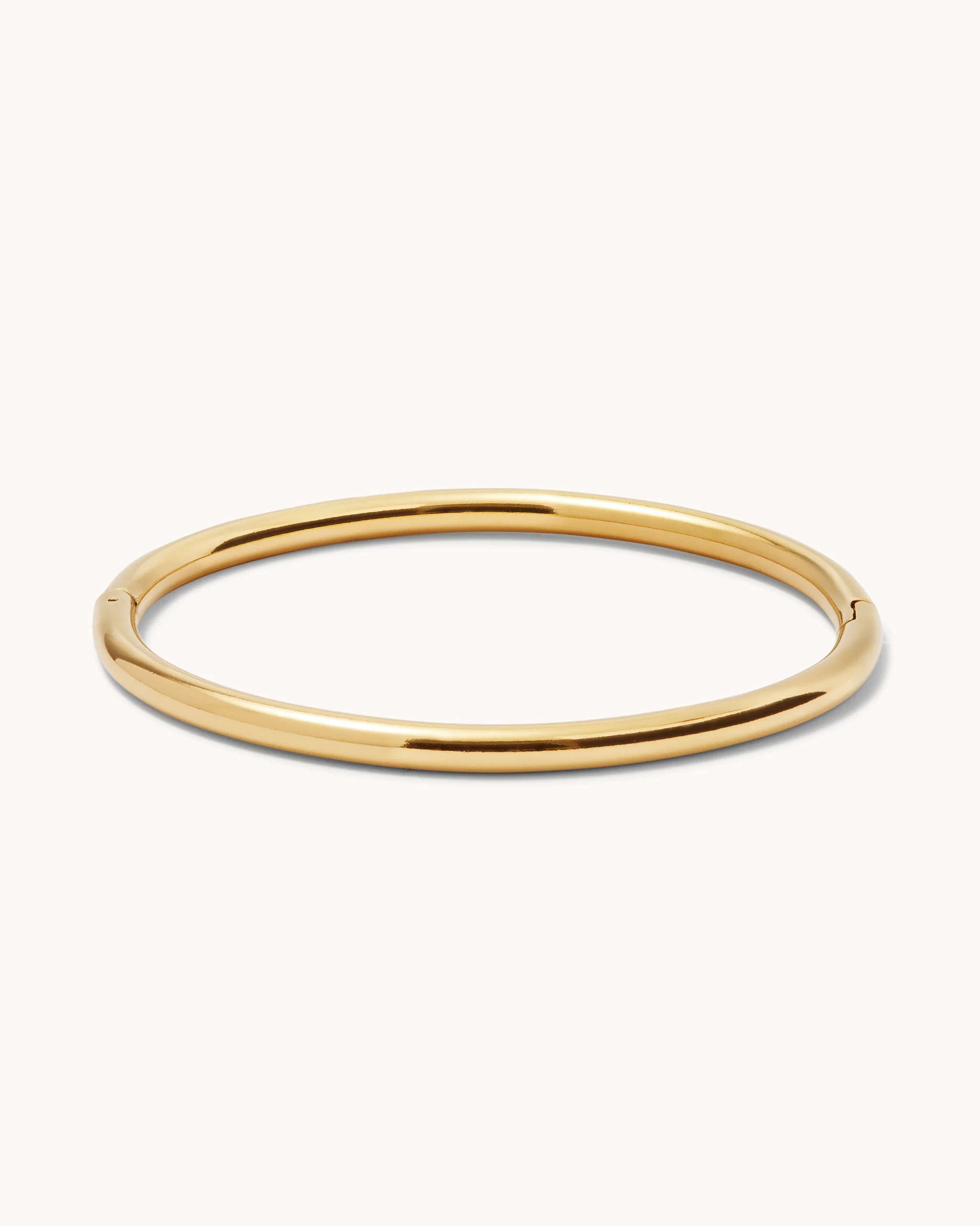 Smooth Rounded Bangle in Gold