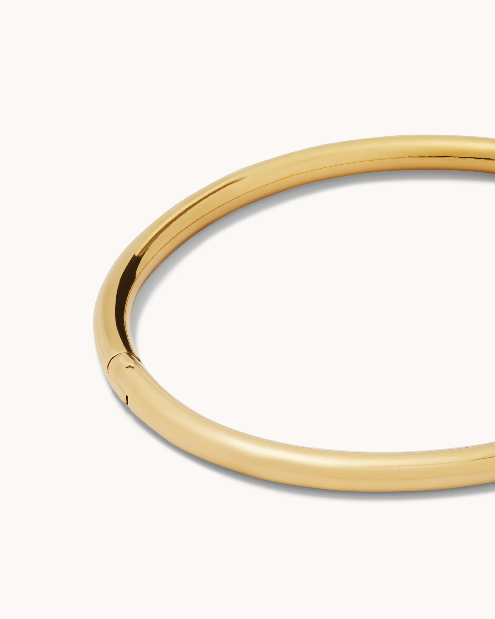 Smooth Rounded Bangle in Gold - Image 2