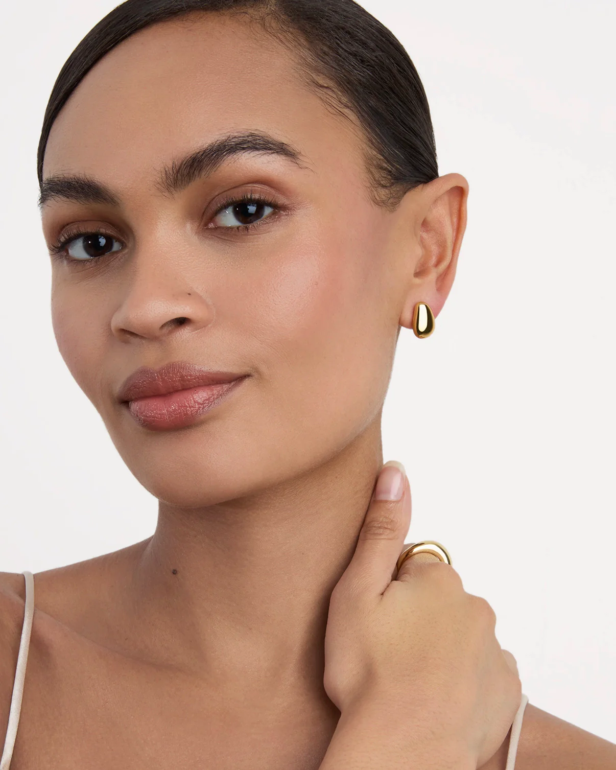 Waterproof Mini Pebble Studs in Gold - Image 2