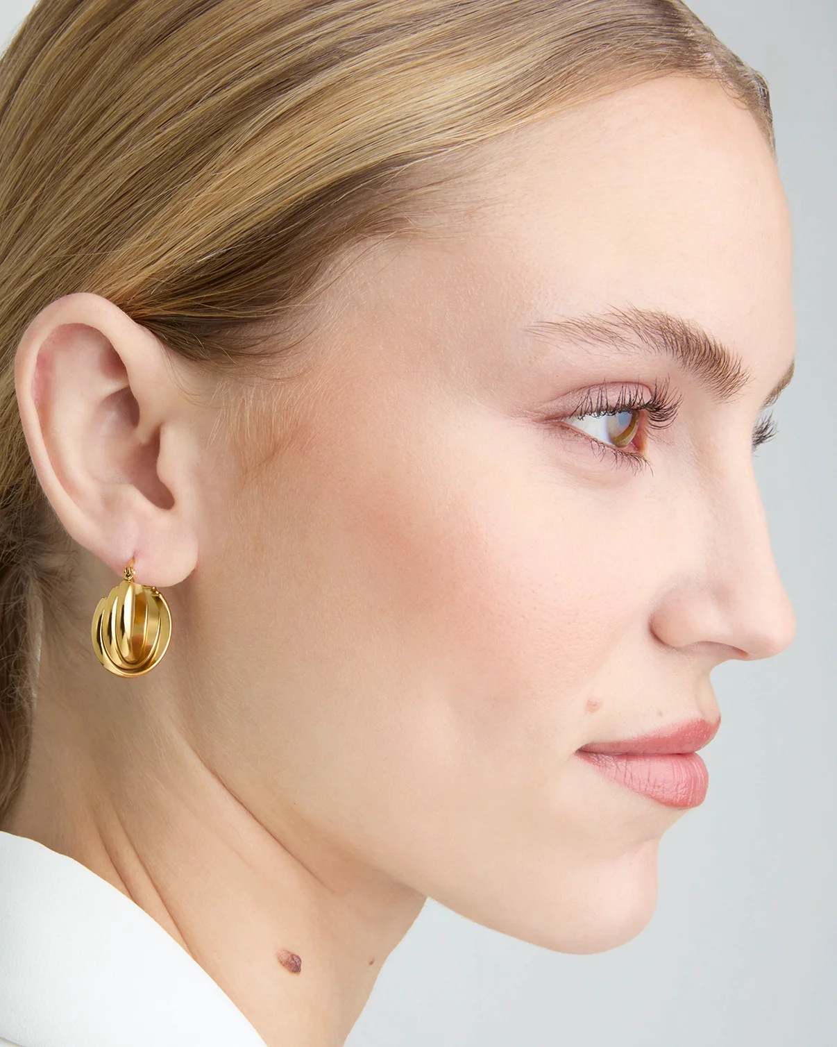 Waterproof Triple Layer Twisted Hoop Earrings in Gold - Image 2