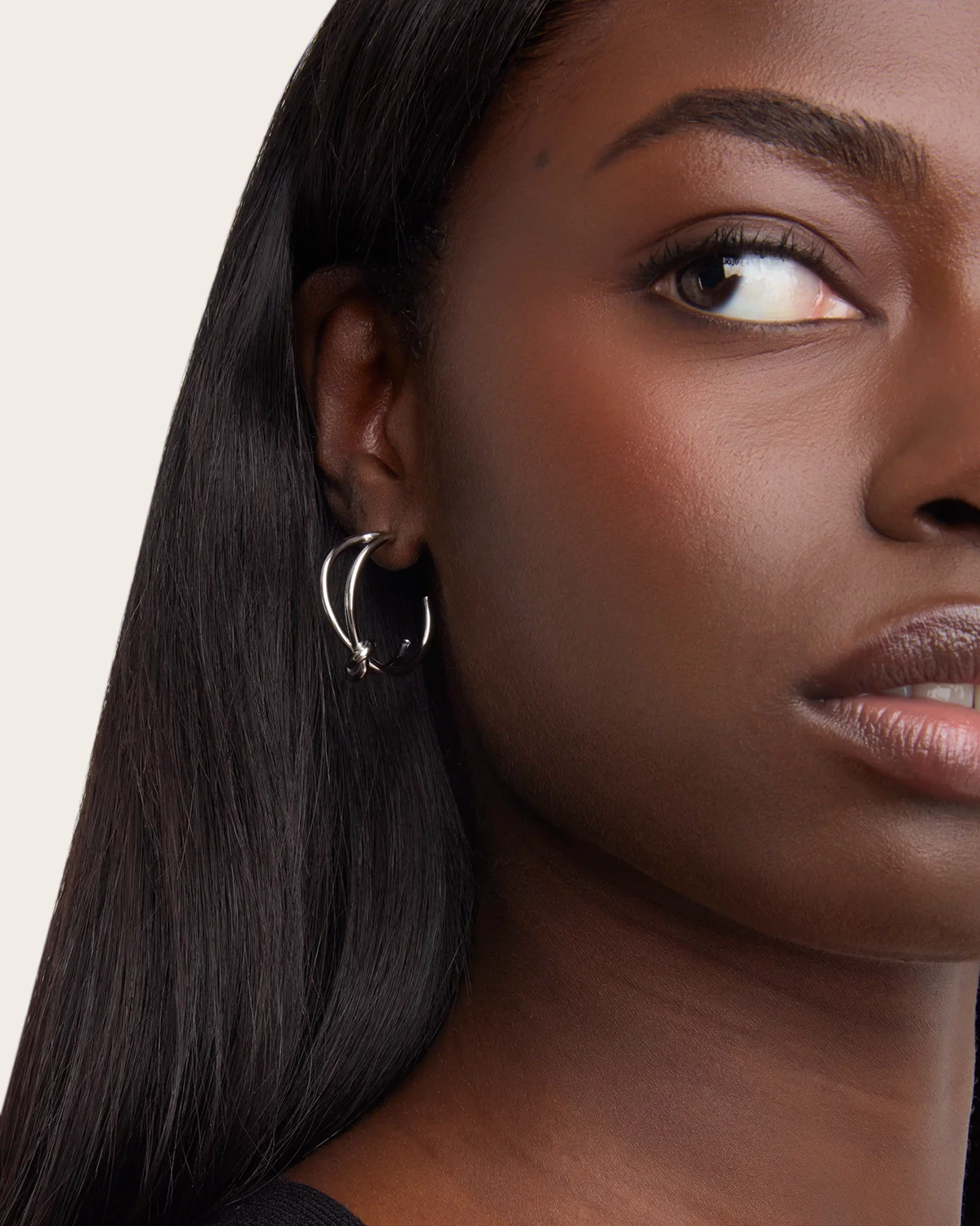 Waterproof Double Layered Knot Hoop Earrings in Silver - Image 2