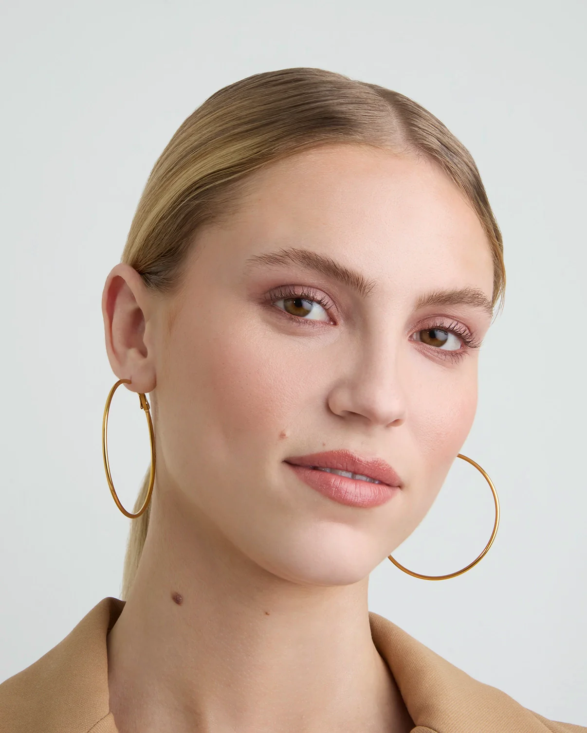 Waterproof Large Thin Round Hoops in Gold - Image 2