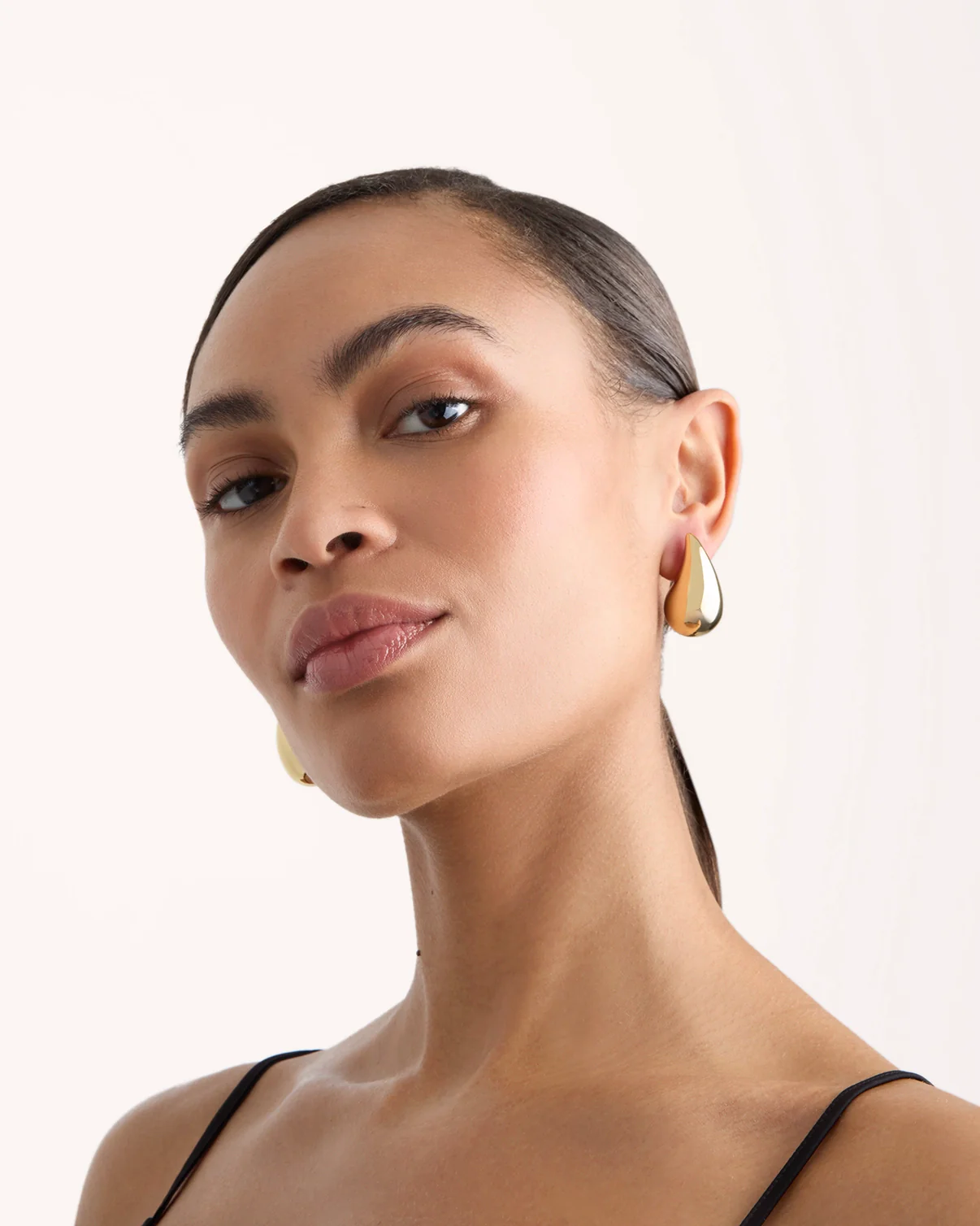 Teardrop Stud Earrings in Gold - Image 2