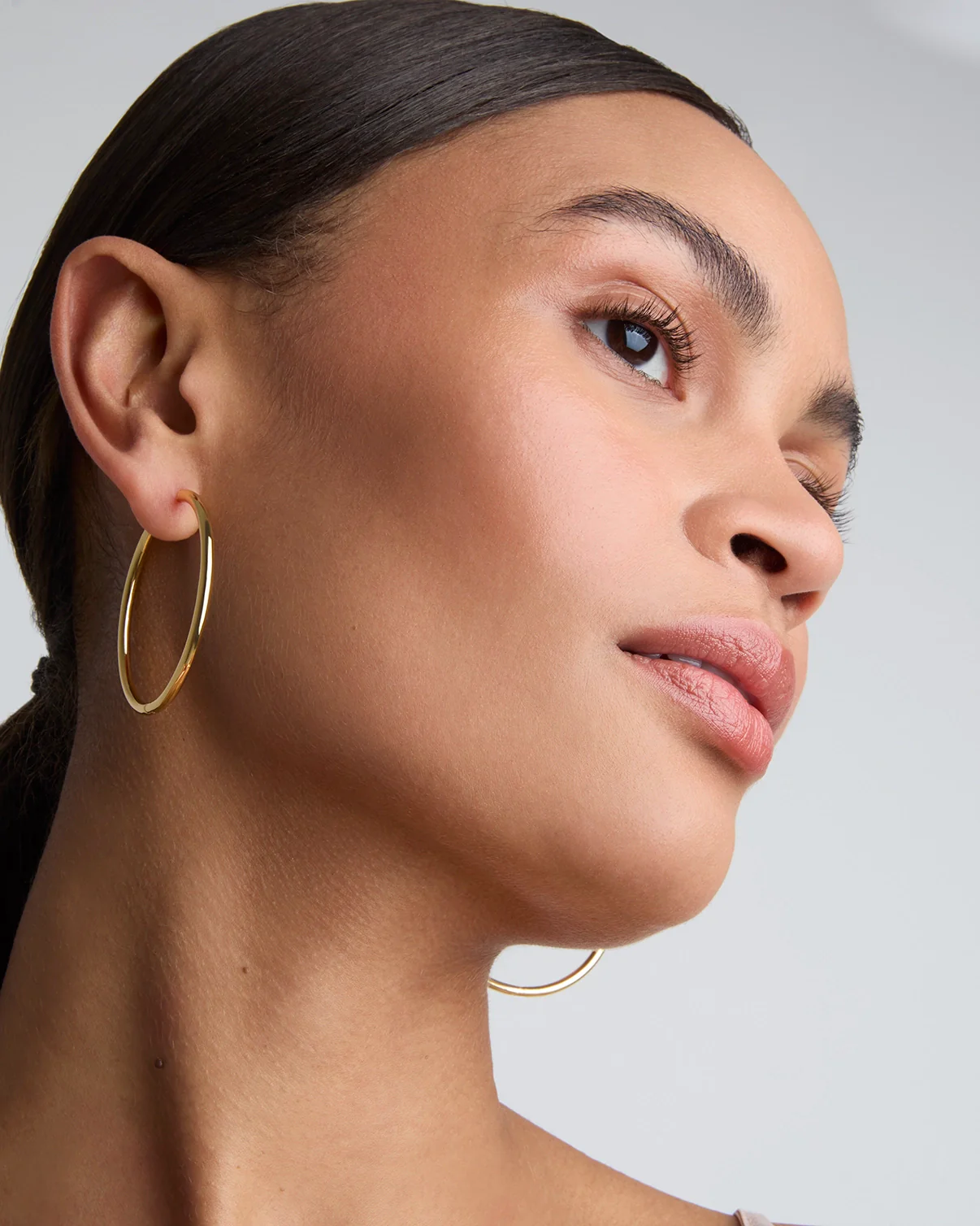 Thin Large Hoop Earrings in Gold
