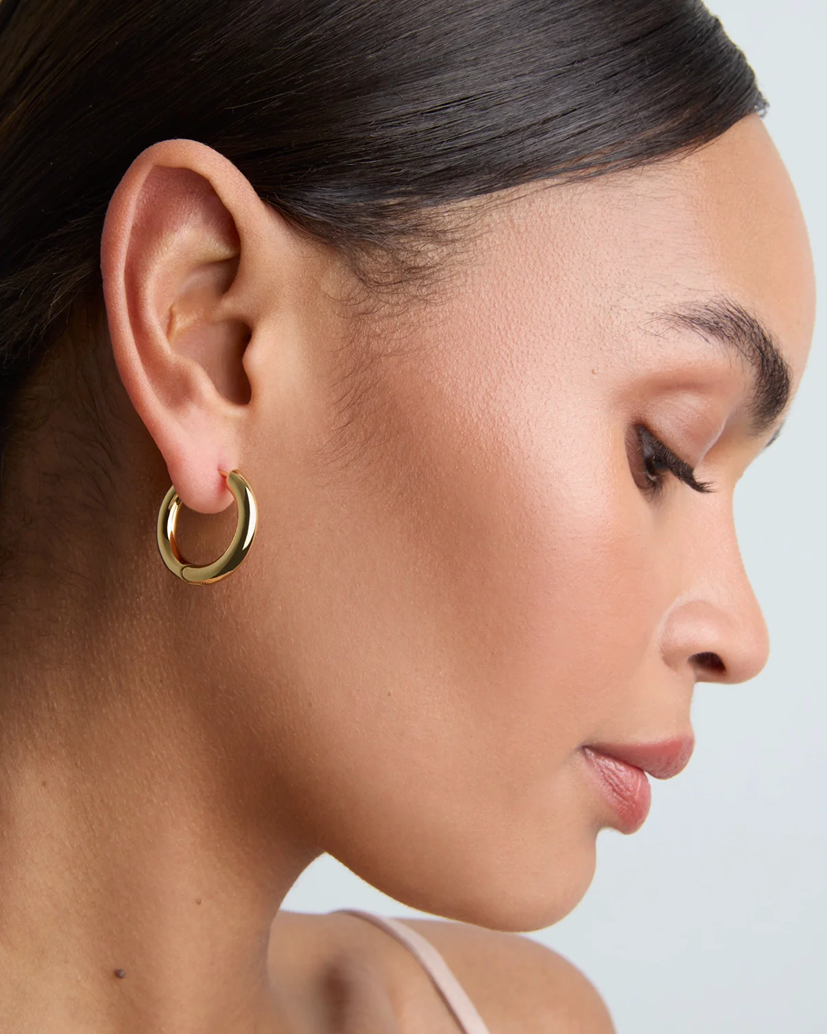 Large Thick Hoop Earrings in Gold - Image 2