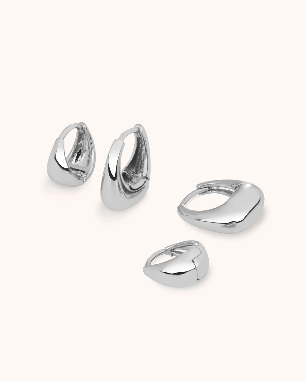 Oval Seamless Huggie Hoop Earrings in Silver - Image 3