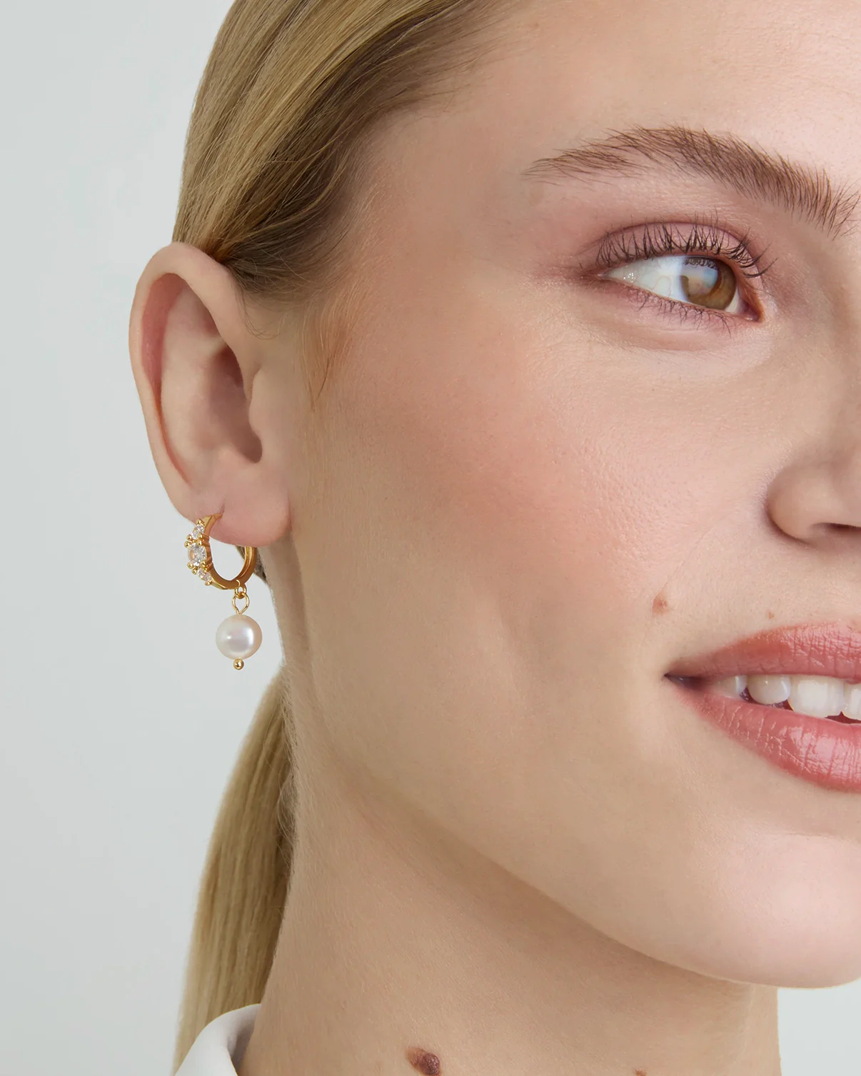 Cubic Zirconia Pearl Drop Hoops in Gold - Image 2